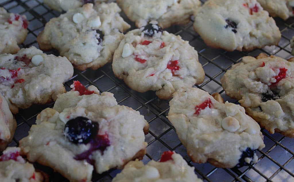 red white blueberry cookies on wire rack