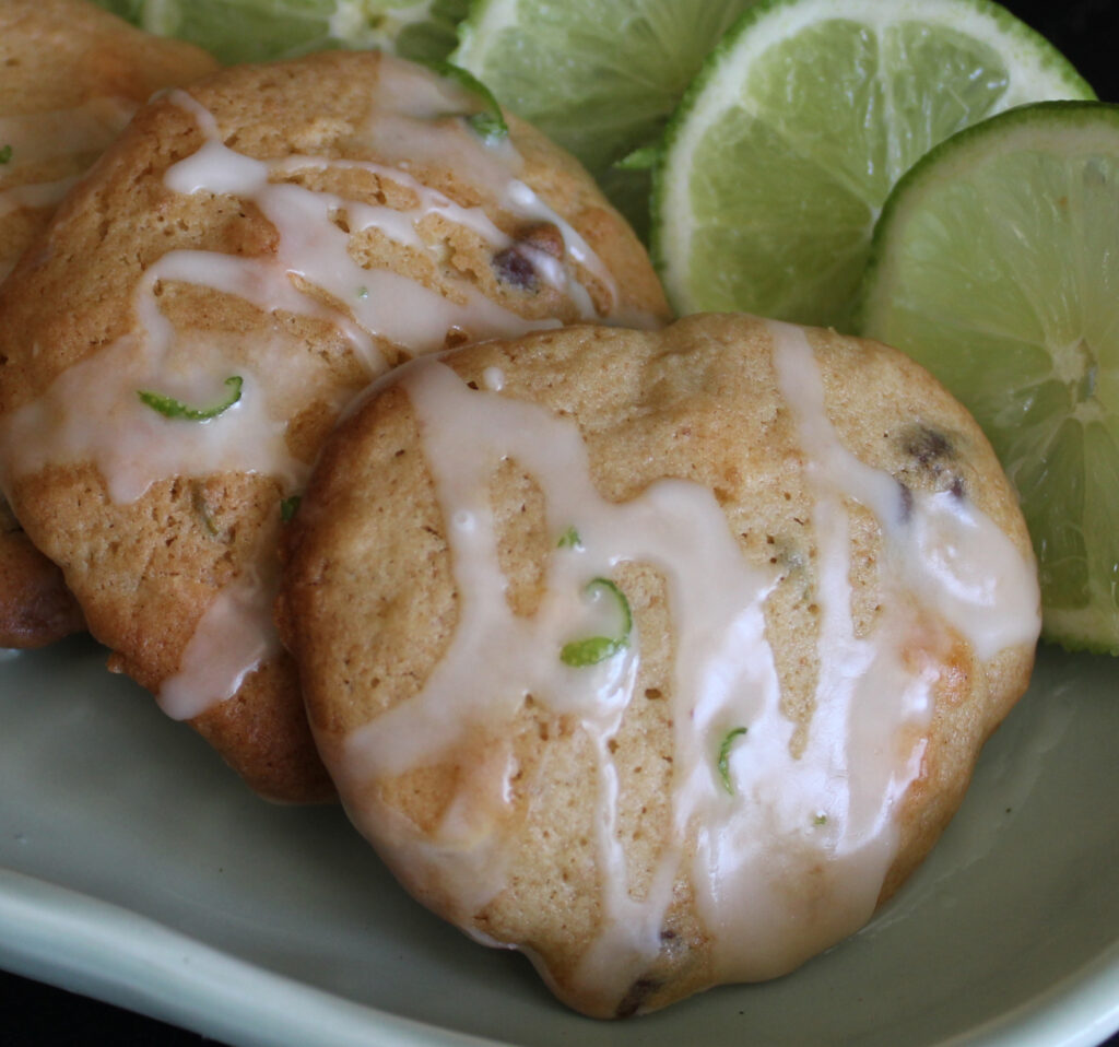 key lime chocolate chip cookies on a light green plate