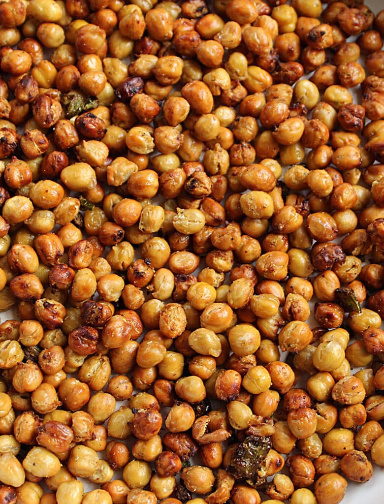 close up of finished golden brown spicy chickpeas with jalapenos.