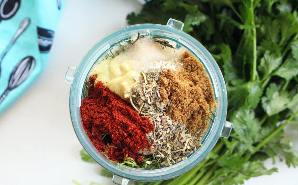 Overhead shot of Cilantro Dill Dressing ingredients in a single serve blender before it is blended.