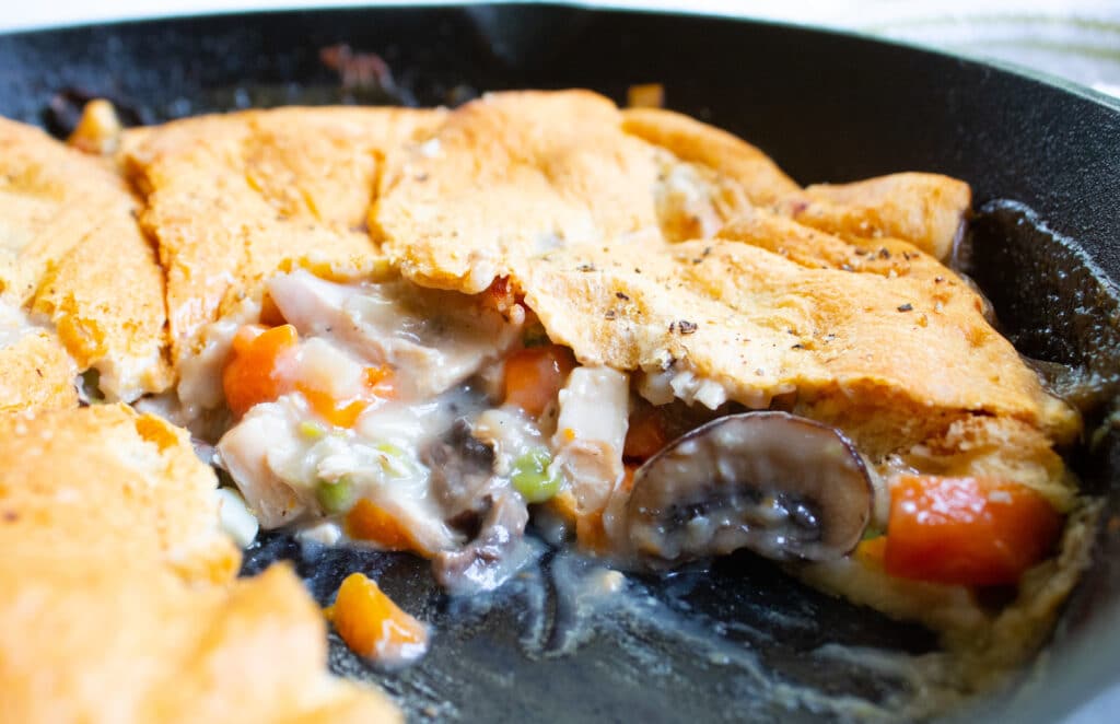 close up of chicken pot pie in the cast iron skillet