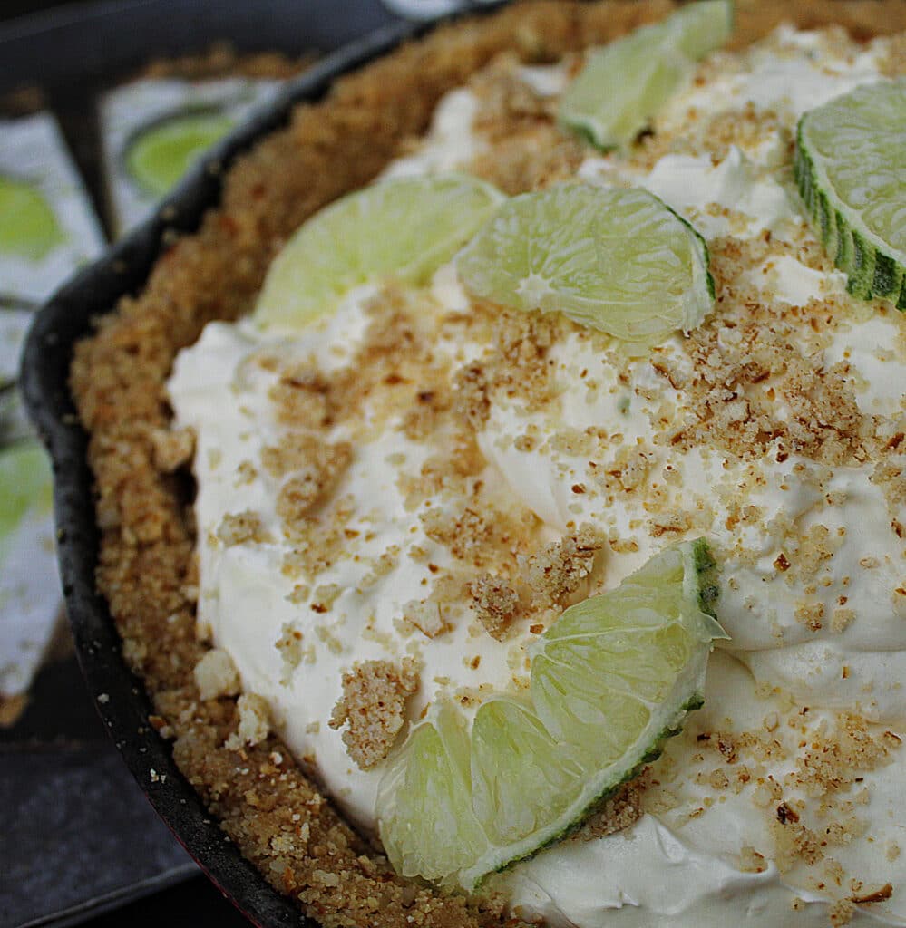 closeup of key lime cold cast iron pie with graham cracker crust