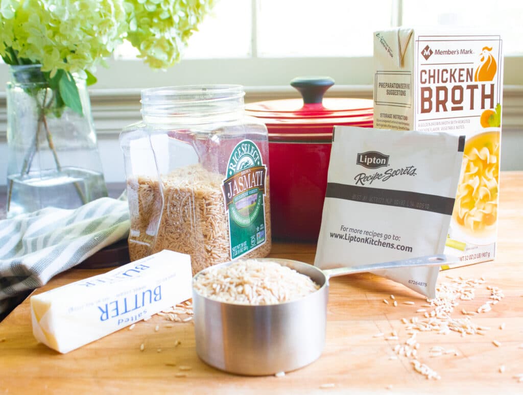 Ingredients for baked rice on a butcher block