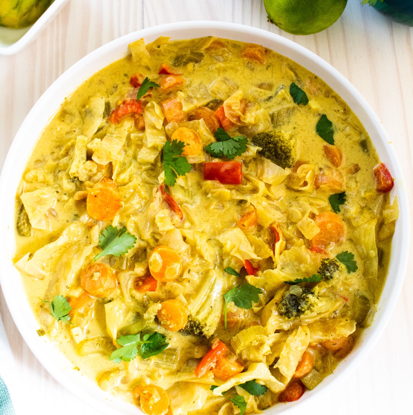 curry vegetable soup in a white bowl