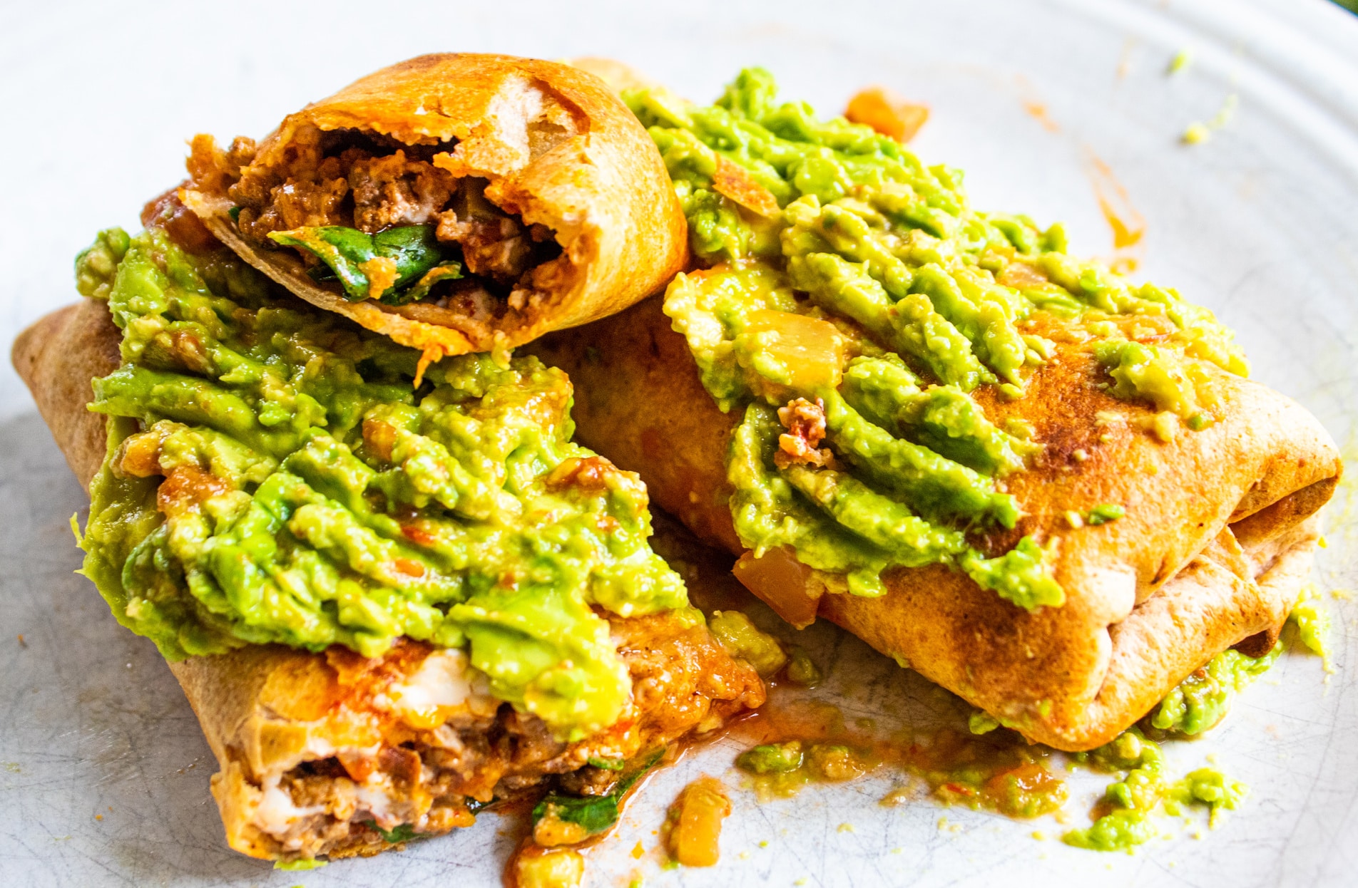 crunchy burritos with spicy avocado