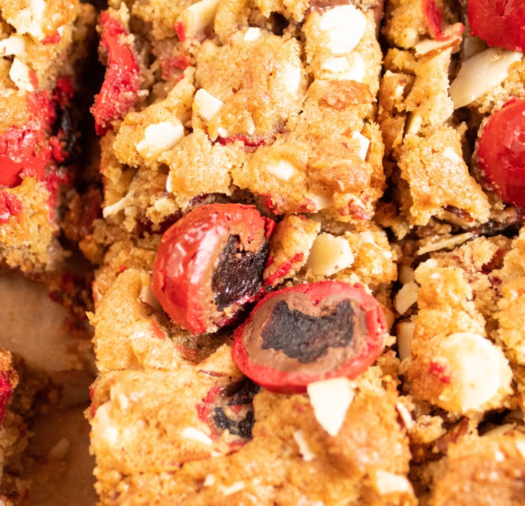 close up of delicious chocolate covered cherry chunk cookie bars