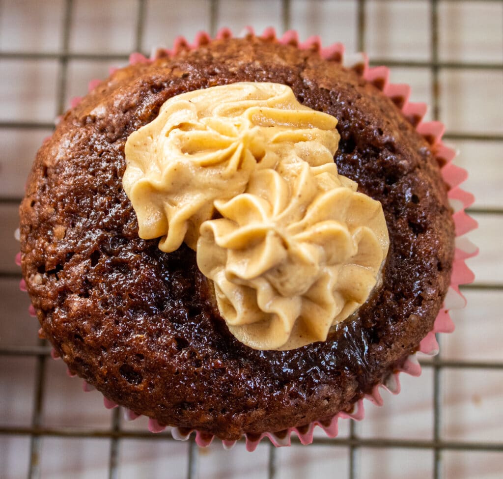 Frosted banana brownie cupcake overhead single cupcake