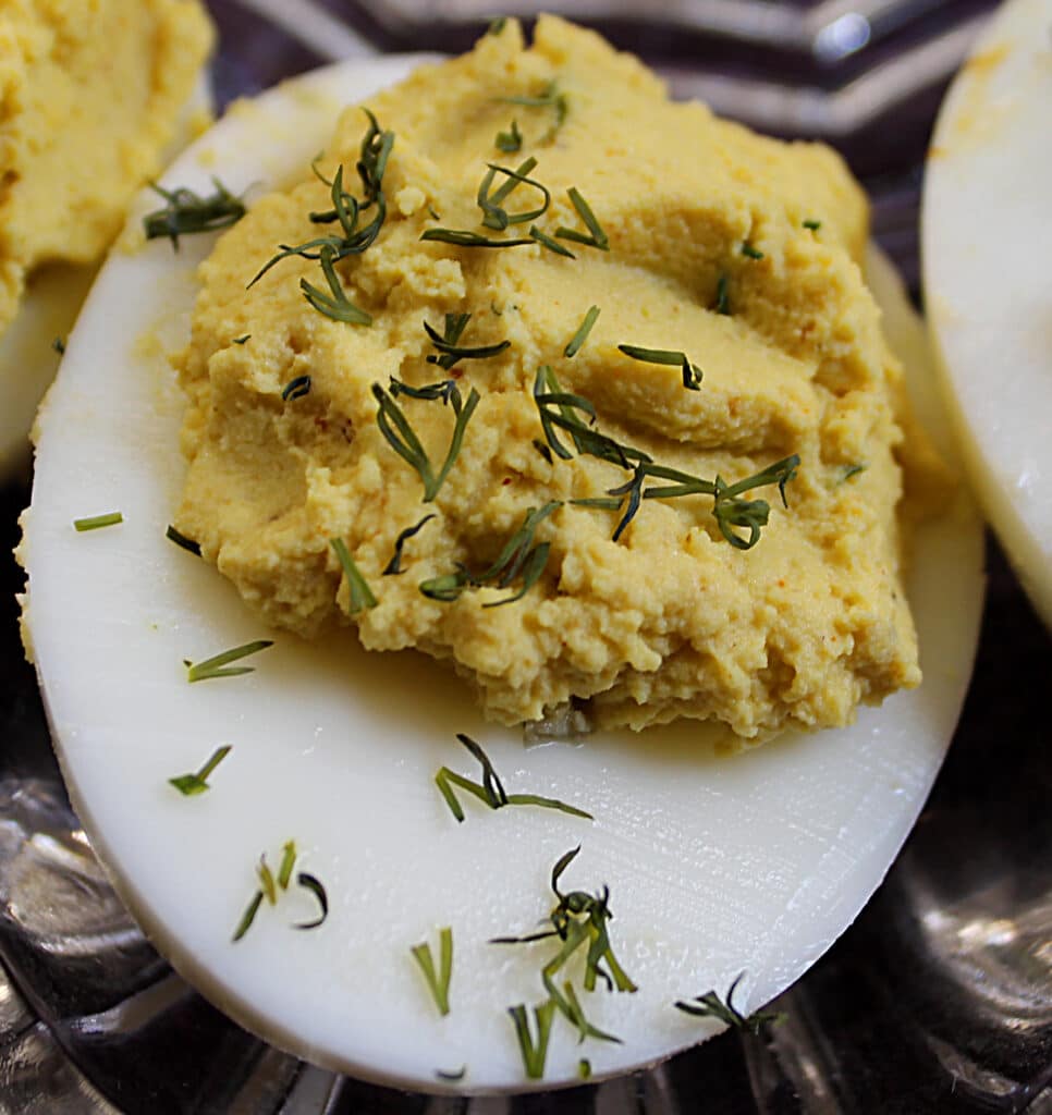 close up of a curry dill deviled egg