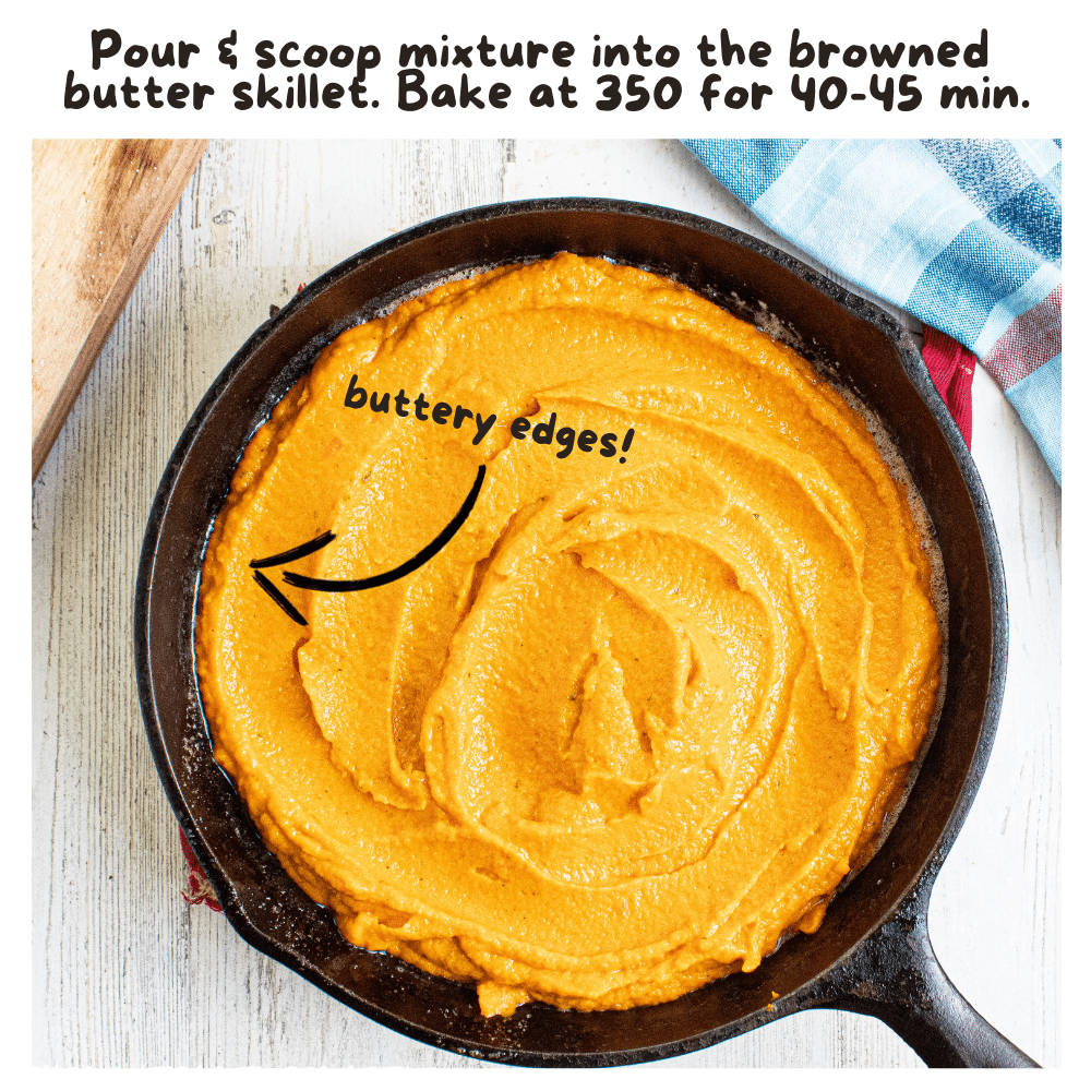 raw brown butter carrot souffle in a cast iron skillet with melted butter on the edges with written instructions