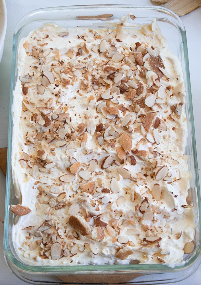 Layer of almond-cookie mixture on top of banana pudding filling.