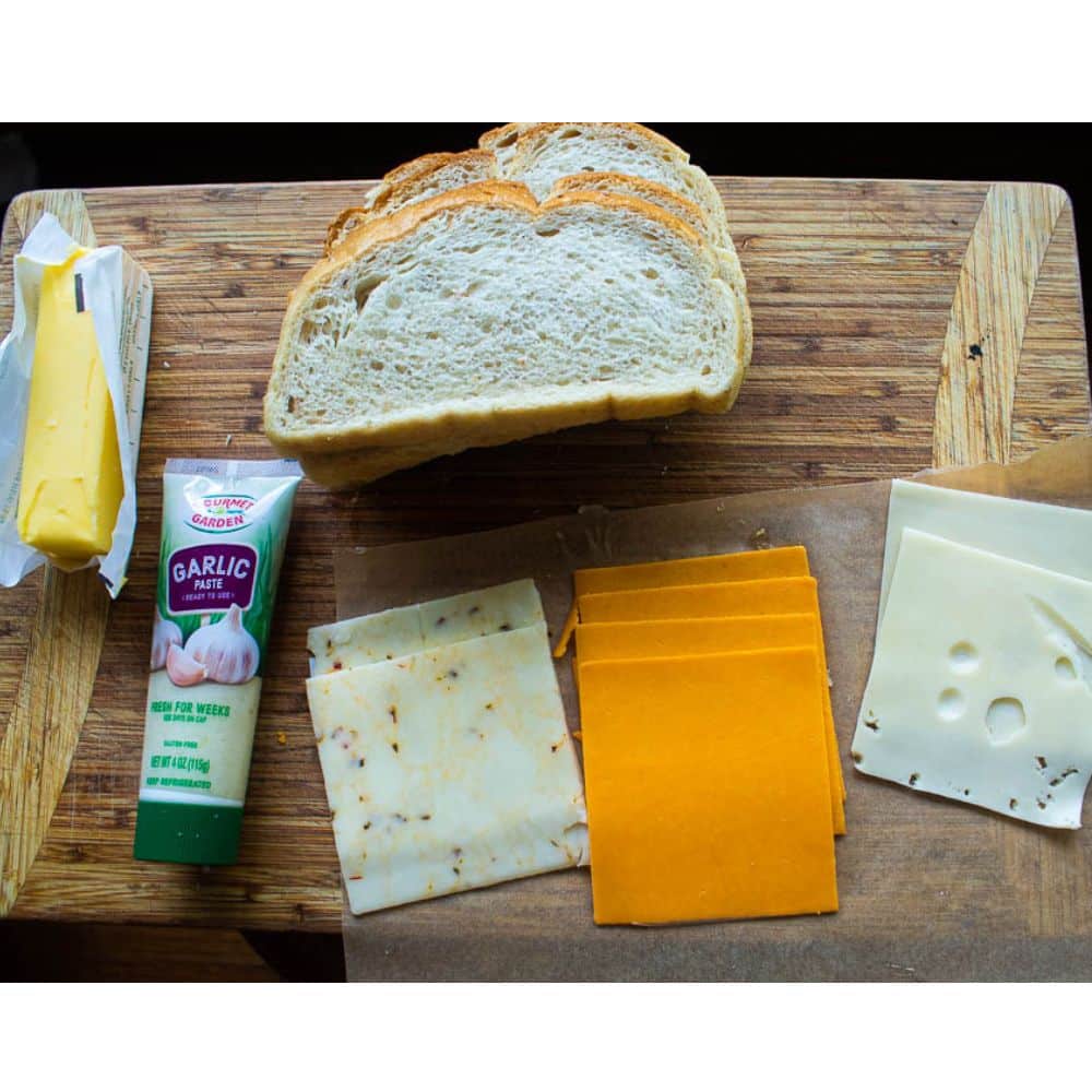 Air fryer Grilled Cheese Ingredients on a wood cutting board.